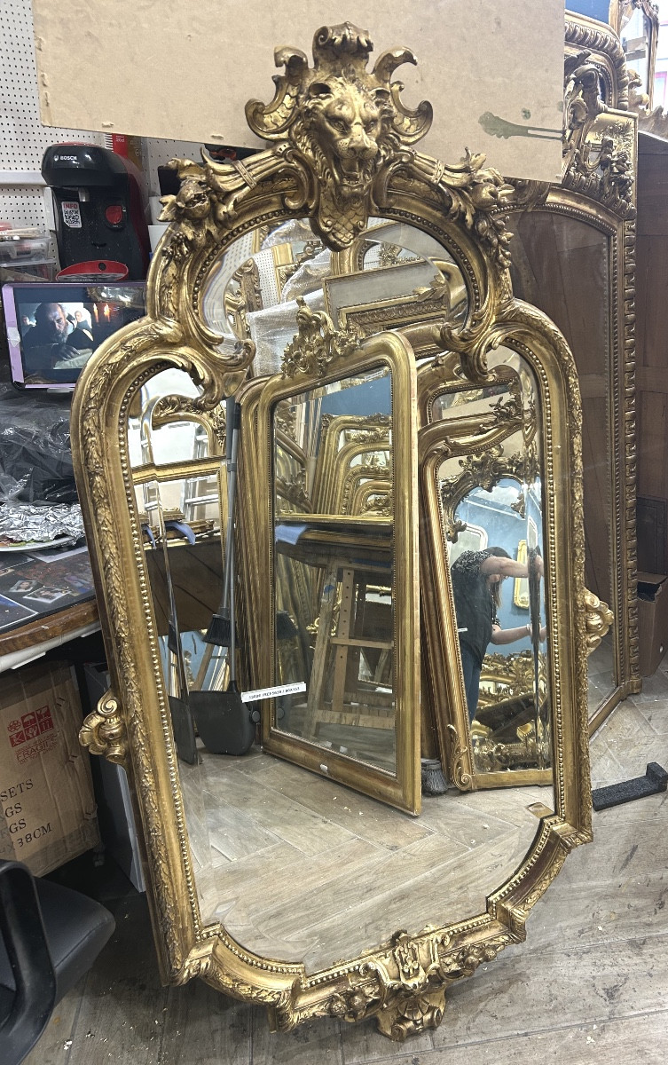 Miroir tête de lion glacé biseauté 