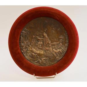 Grand médaillon à décor de volatiles