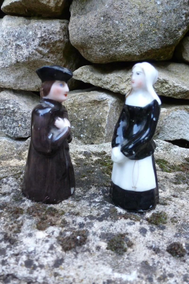 Pair Of 19th Century Porcelain Extinguishers