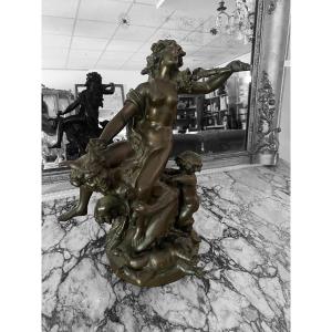 Bronze : femme chevauchant un faune 