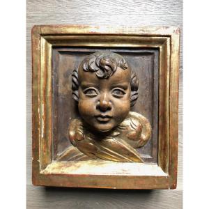 Angel Head Carved In Its Wooden Frame