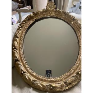 Joli miroir oval XVII ème 