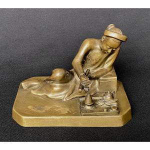 Fumeur d'opium en bronze