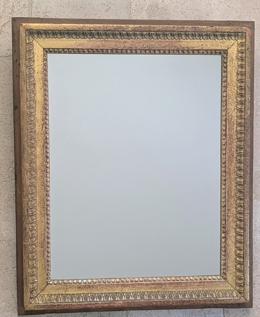 Miroir de boiserie en bois sculpté et doré XVIIIème siècle 