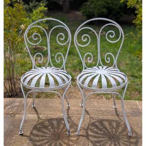2 chaises de jardin en fer forgé rivetées et à lames