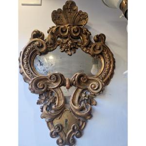 Small 18th Century Italian Gilded Wooden Mirror Gilded Wood And Finely Carved With Rocaille