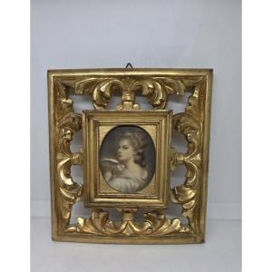 Portrait miniature de profil d'une jeune femme dans un cadre doré (XIXe siècle)
