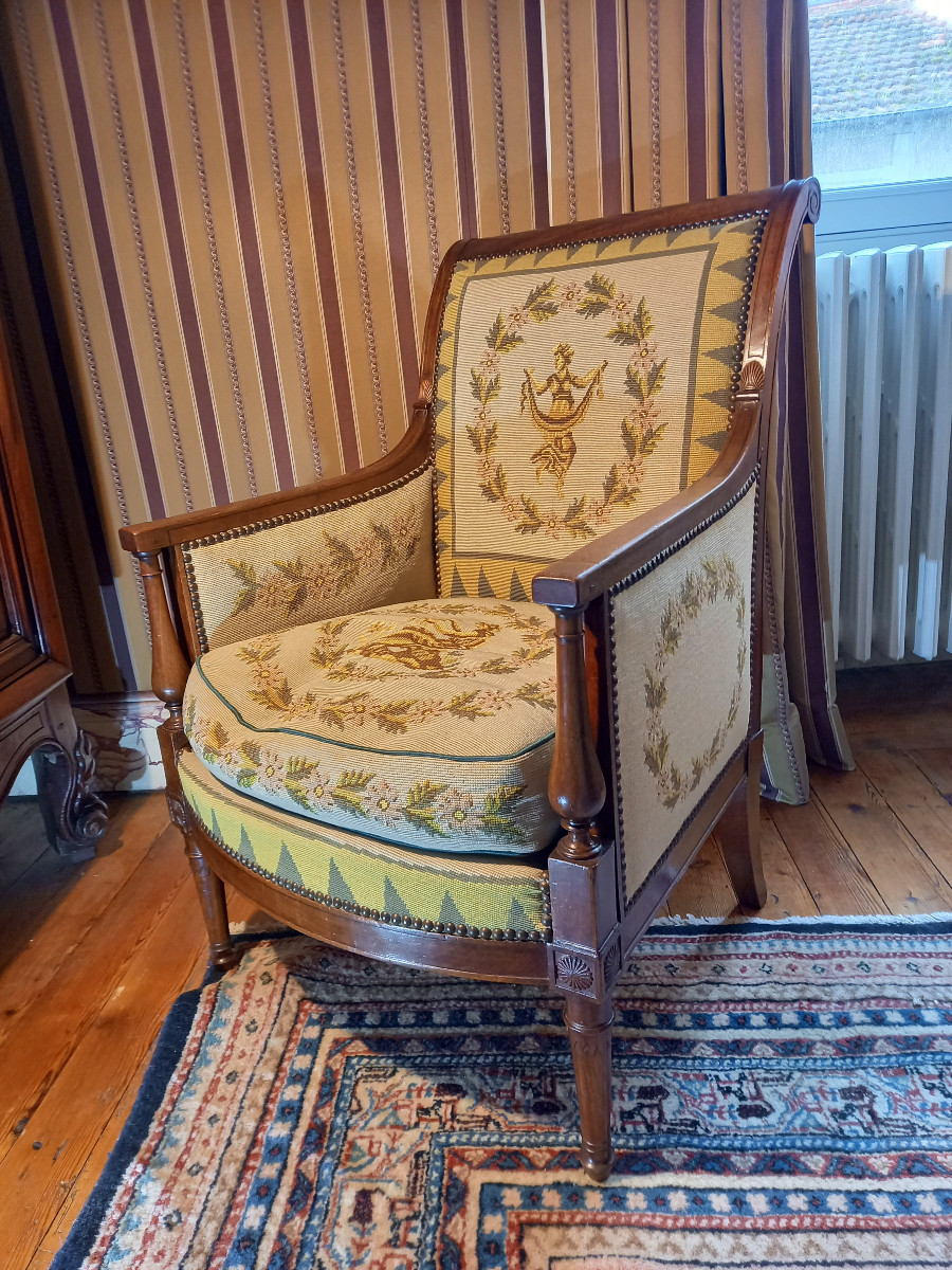 A Very Pretty Bergère Chair In Mahogany And Mahogany Veneer From The Directoire Period.