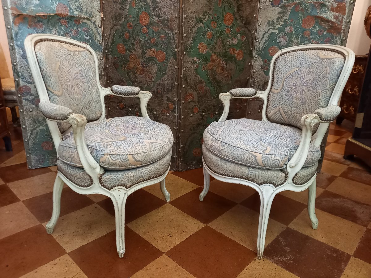 Pair Of Period Louis XV Cabriolet Armchairs In Simply Molded White-lacquered Wood