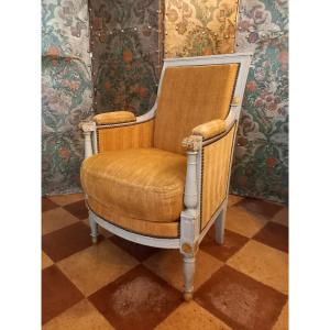 A Comfortable, Molded And Carved Wingback Chair, Reupholstered In Gray And Gold, From The Directoire-consulat Period
