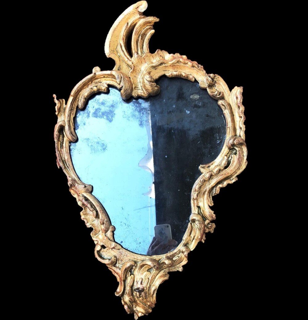 Antique Mirror In Carved And Gilded Wood From The 18th Century