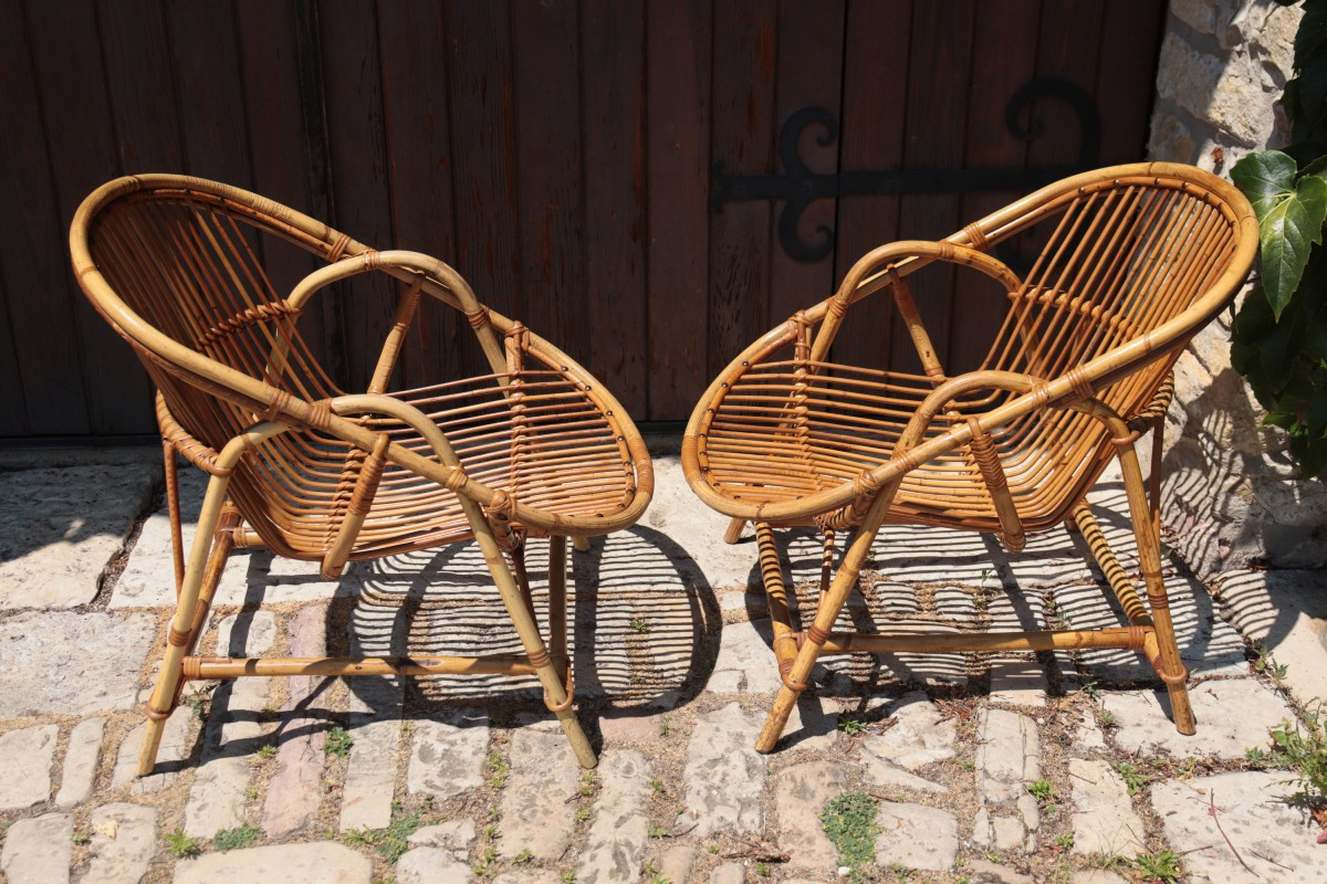 Paire de fauteuils en rotin de Audoux-Minnet