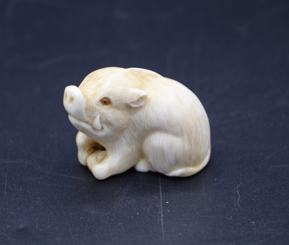 Carved Ivory Netsuke, Japan, Meiji Period (1868–1912), Crouching Boar, Signed