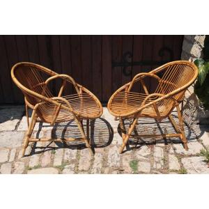 Paire de fauteuils en rotin de Audoux-Minnet