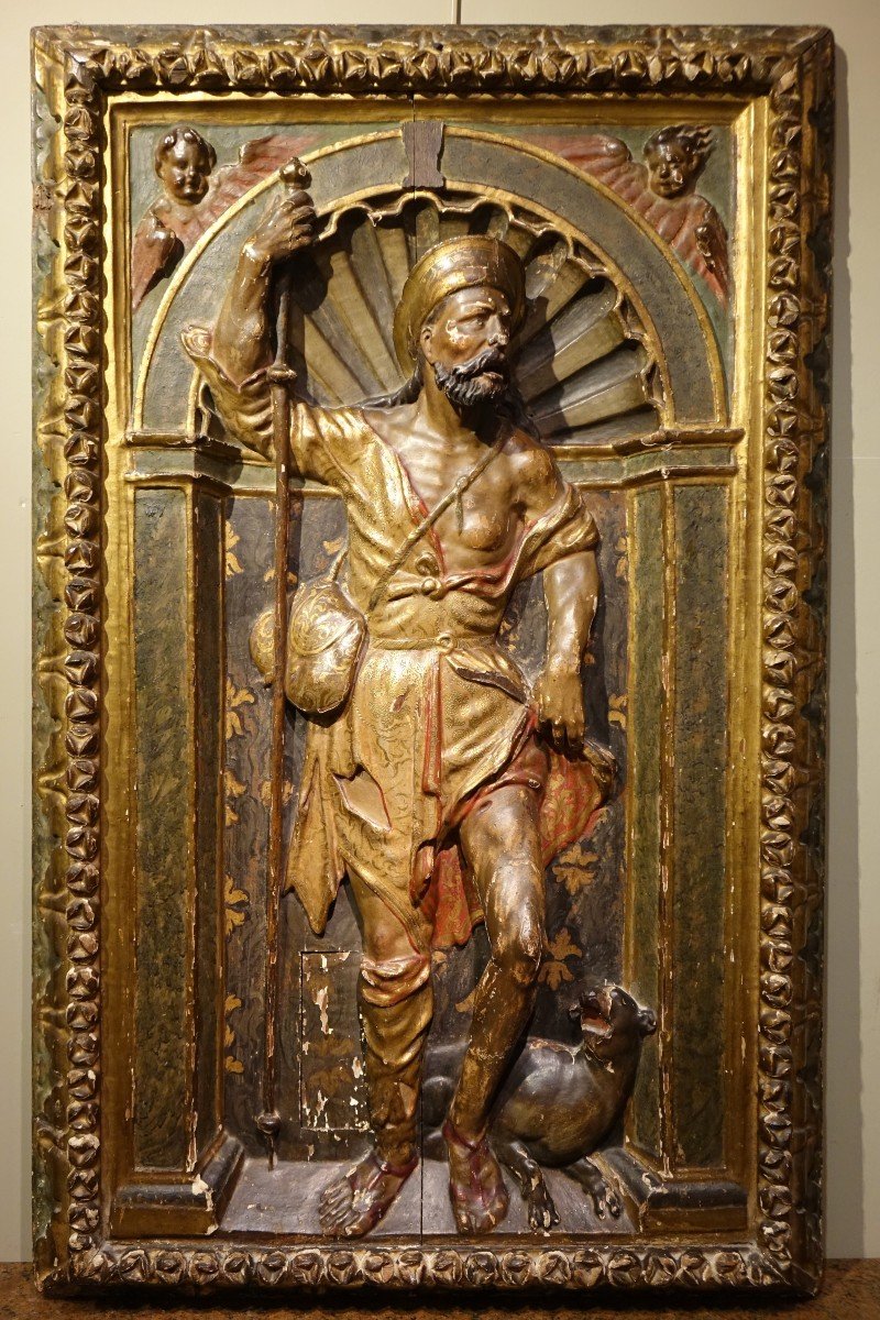 Mi-relief en bois doré et polychromé, représentant saint-Roch.  Espagne , 16e S.