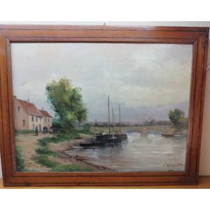 Batelier sur la rivière, huile sur toile signée Edmond