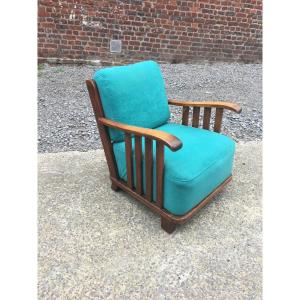 Fauteuil 1950 en chêne massif , tissu et ganiture en bon état