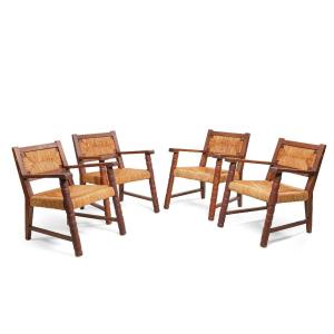Suite de 4 fauteuils en chêne et paille circa 1950 dans le style de Dudouyt/Courtray 