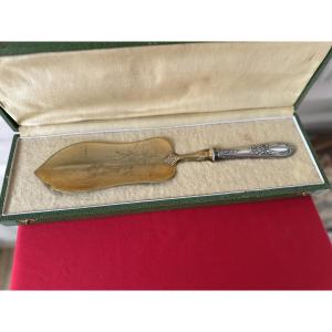Gold-colored Metal Cake Server With A Silver Handle