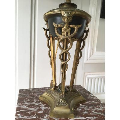 Rare pied de lampe "aux caducées"en bronze doré et patiné 