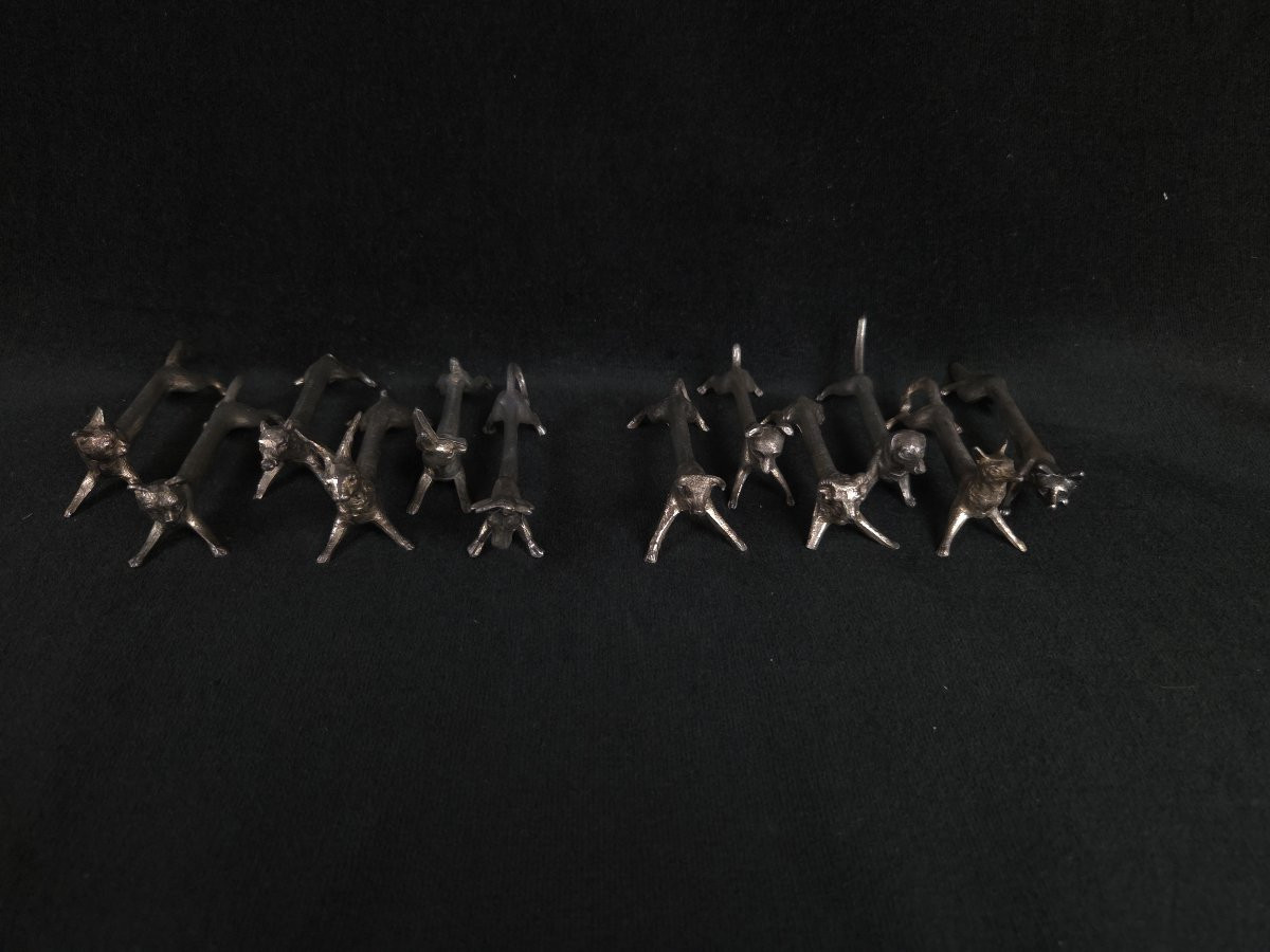 Série de 12 portes couteaux animaliers en métal argenté -photo-1