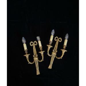 Paire d'appliques en bronze doré de style Louis XVI 