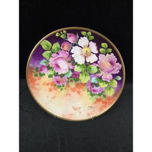 Limoges - Grand plat en porcelaine à décor de fleurs - F. Poujol (XXe siècle)