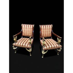 Paire de fauteuils d'apparat de style Empire aux sphinges et lions (XIXe siècle)