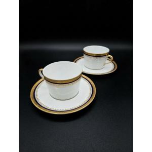 Paire de tasses à déjeuner et sous-tasses en porcelaine de Limoges (XXe siècle)
