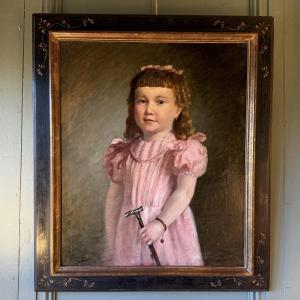 Portrait Of A Little Girl In A Pink Dress