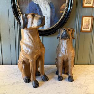 Pair Of Carved And Weathered Wooden Dogs