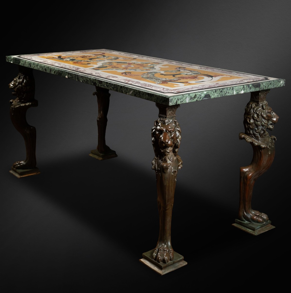 A Polychrome Marble Intarsia Table With Bronze Trapezophoroi