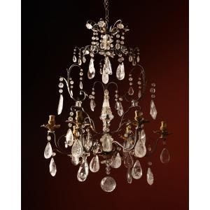Lustre à six feux en fer forgé, bronze doré et cristal de roche, début du XVIIIe siècle