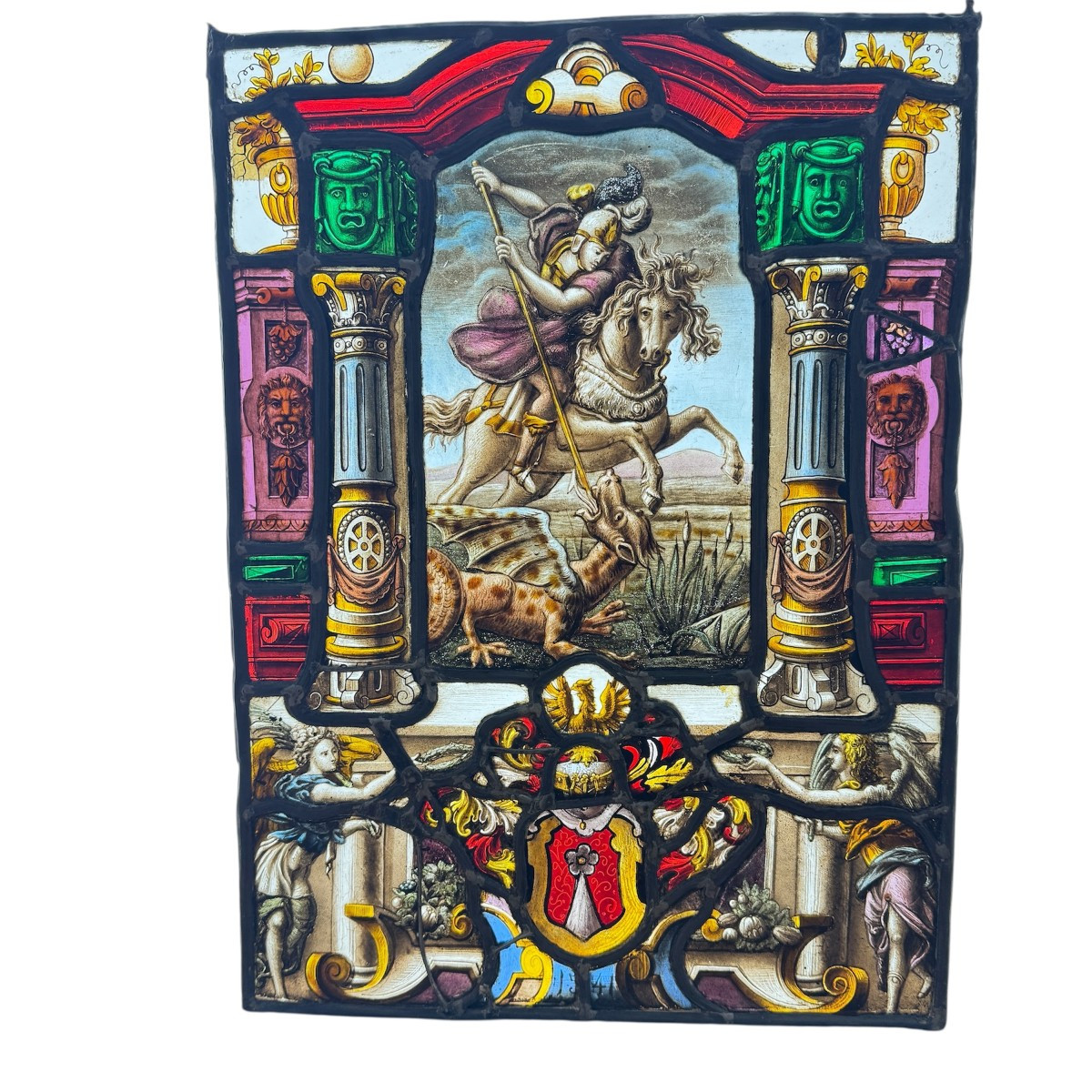 Stained Glass Window In The Renaissance Style Depicting Saint Michael Slaying The Dragon