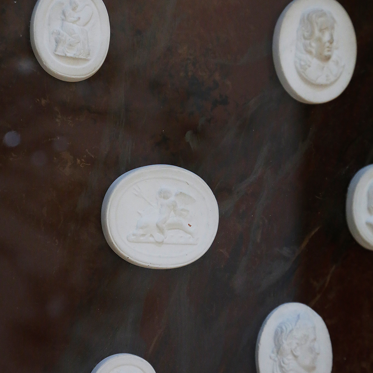 A Coffee Table Decorated With Medallions From The 1970s-photo-4