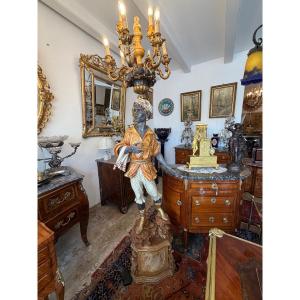 Nubien porte-lumière en bois sculpté et polychromé