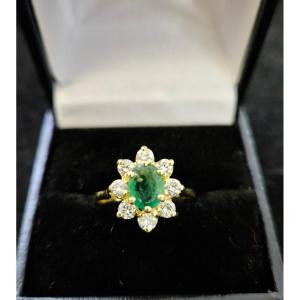 Bague entourage émeraude diamants or jaune