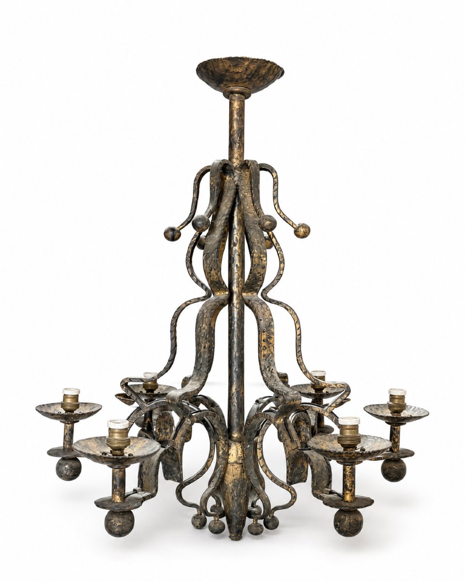 Lustre en fer forgé et doré