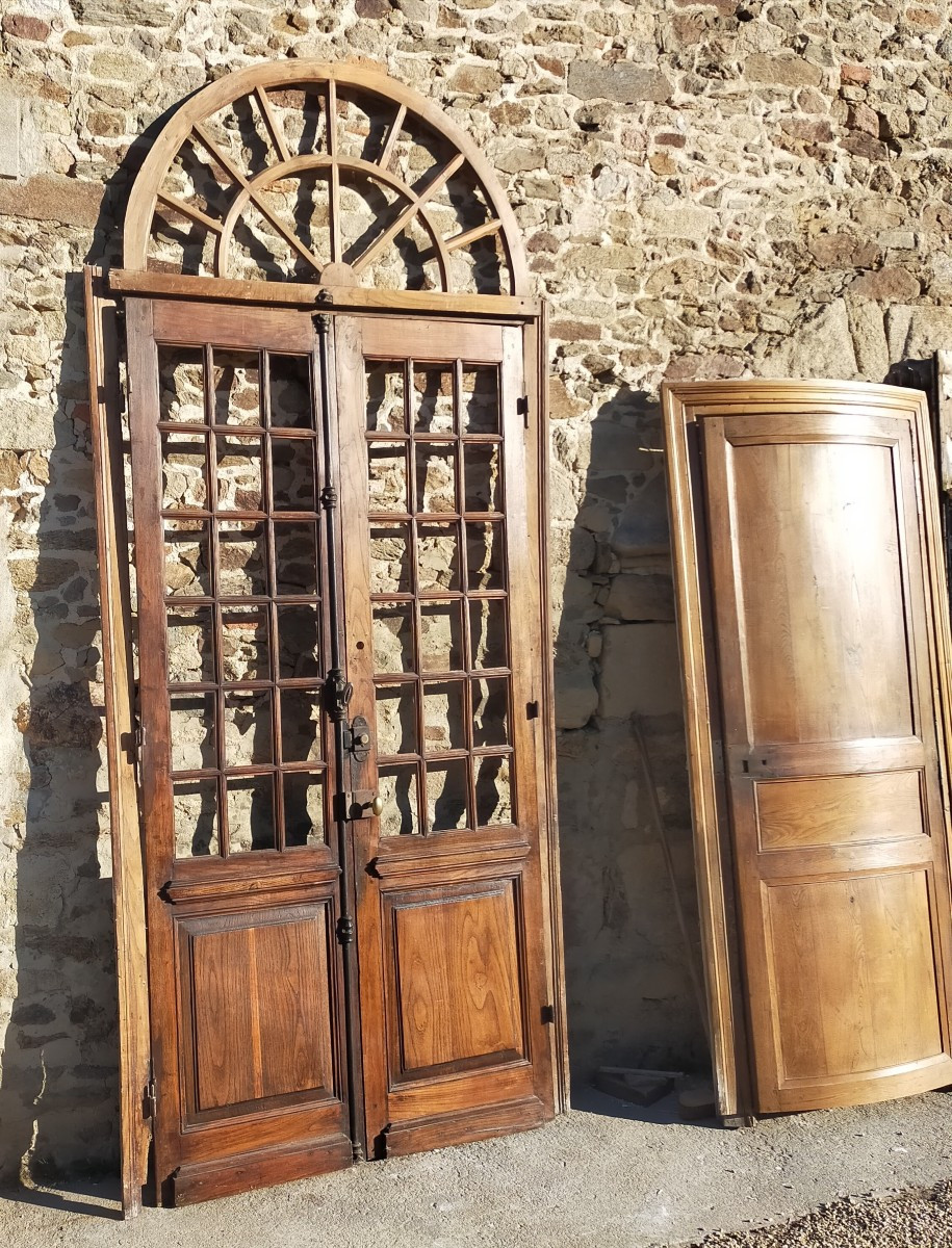 Double porte vitrée ancienne en chêne Orangerie avec son imposte cintrée
