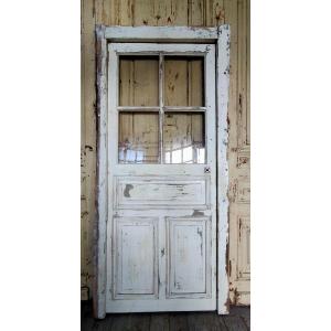 Old Glass Door With 4 Panes With Its Frame