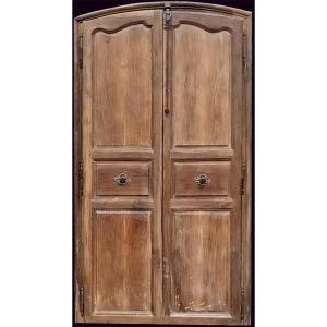 Old 18th Century Arched Double Door In Walnut With Its Door Frame Woodwork