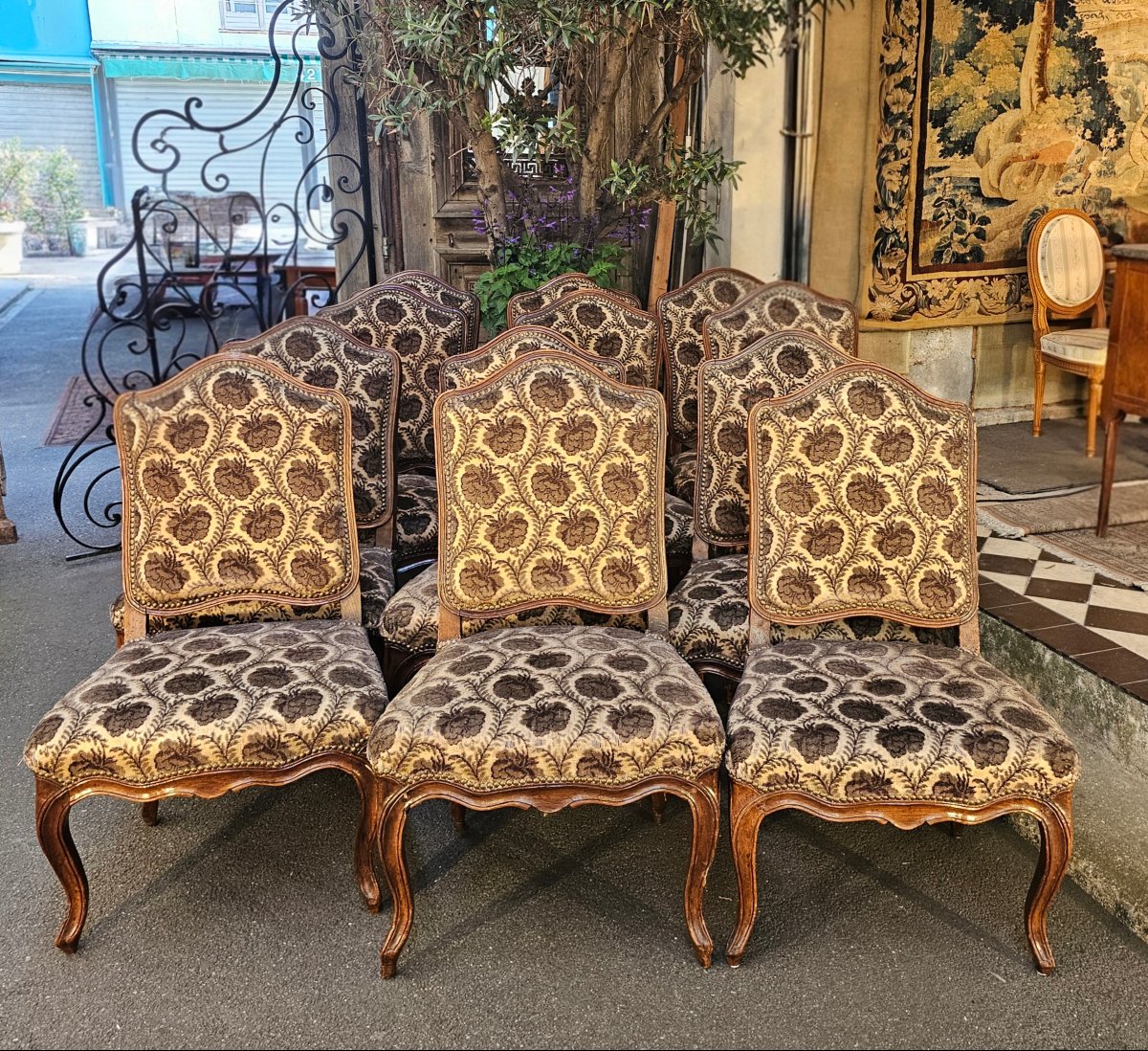 Twelve Walnut Chairs From The 18th Century