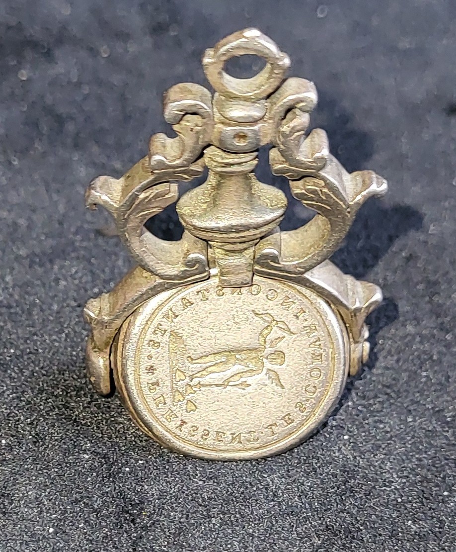 Silver Rotating Personality Seal With A Motto About Love