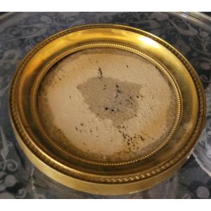 Cadre rond  en bronze doré pour une miniature 
