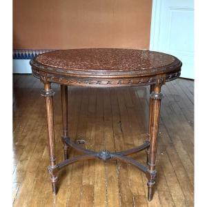     Guéridon ovale style Louis XVI vers 1900, noyer et marbre du Languedoc  Élégant guéridon ov