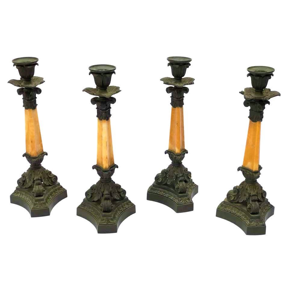 Four 19th Century Patinated Bronze And Yellow Sienna Marble Candlesticks By Denière, Paris