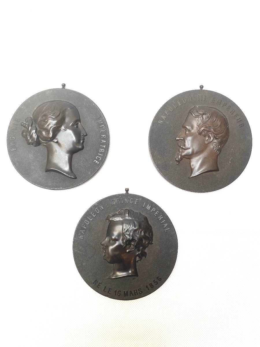 Three medallions in &quot;hardened wood&quot; (Bois Durci) representing the portraits in relief of Napoleon III Emperor, Eugenie Empress and Napoleon Prince, attributed to Francois Lepage