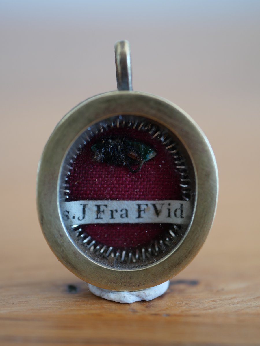Small Oval Brass Reliquary Containing A Relic To Be Identified, 19th Century