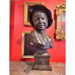 Emilio MARSINI, "Il Bricconcello" (le petit chenapan), buste en bronze à patine noire, 1880