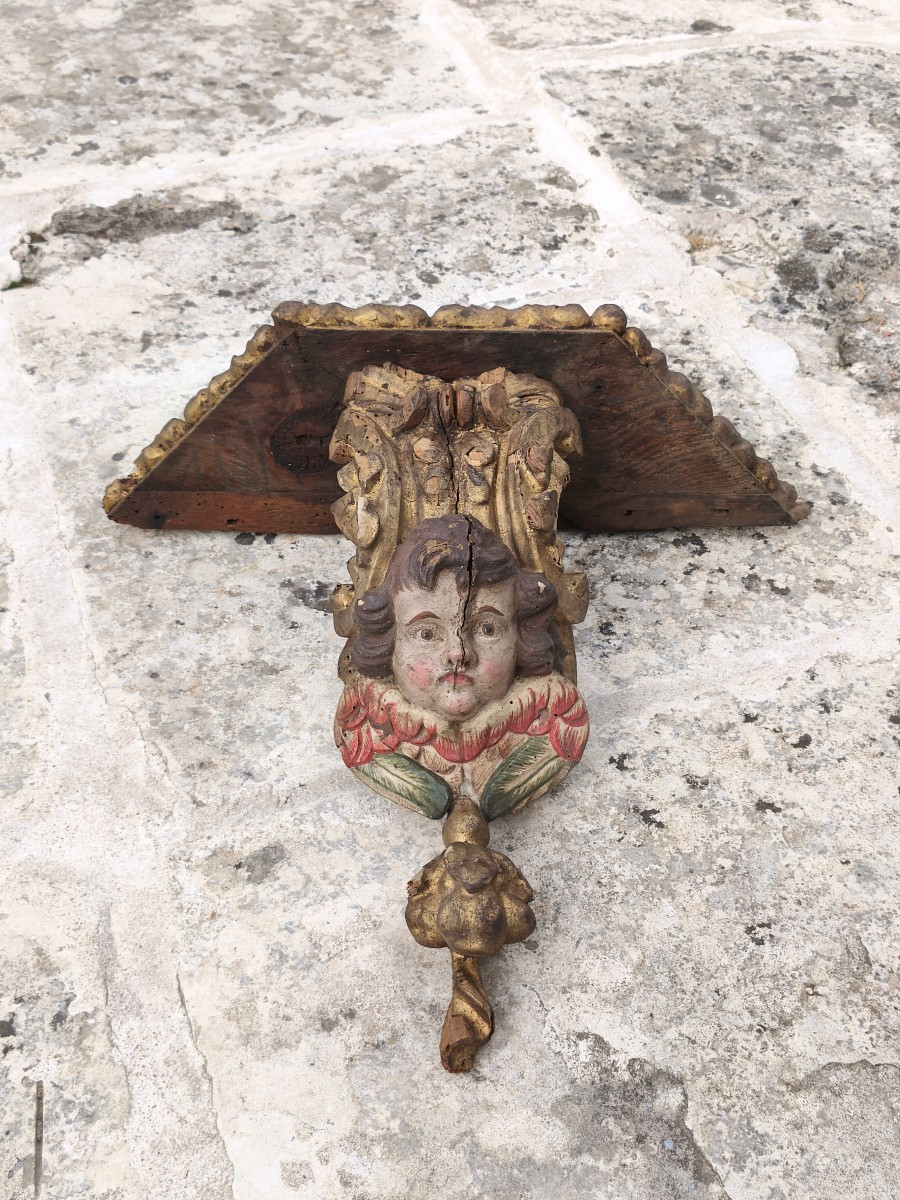 Large Giltwood Wall-mounted Console, With A Carved And Polychrome Wooden Cherub’s Head, 17th C